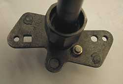 Bronze bushing installed in place of rubber bushing